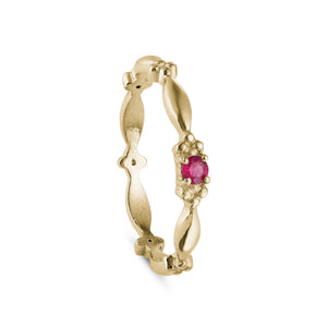Ruby ring in solid gold beaded texture