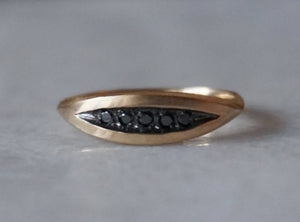Palma black diamond ring in 14k yellow gold with rough textured band and black rhodium plating