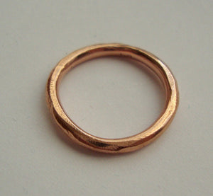 simple rough band in solid 18k rose gold- mark of the maker- wedding ring